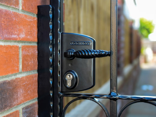 Keyed Gate Latch on black metal garden gate